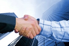 bigstock-Corporate-Deal--Blue-Handshak-resized