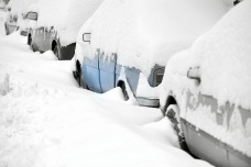 bigstock-Snow-Covered-Cars-resized